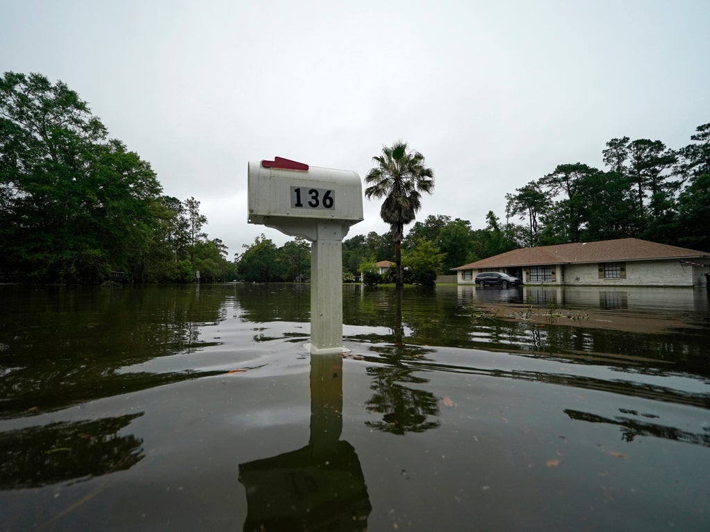 Photos show neighbourhoods swamped by tropical storm Claudette on Gulf Coast