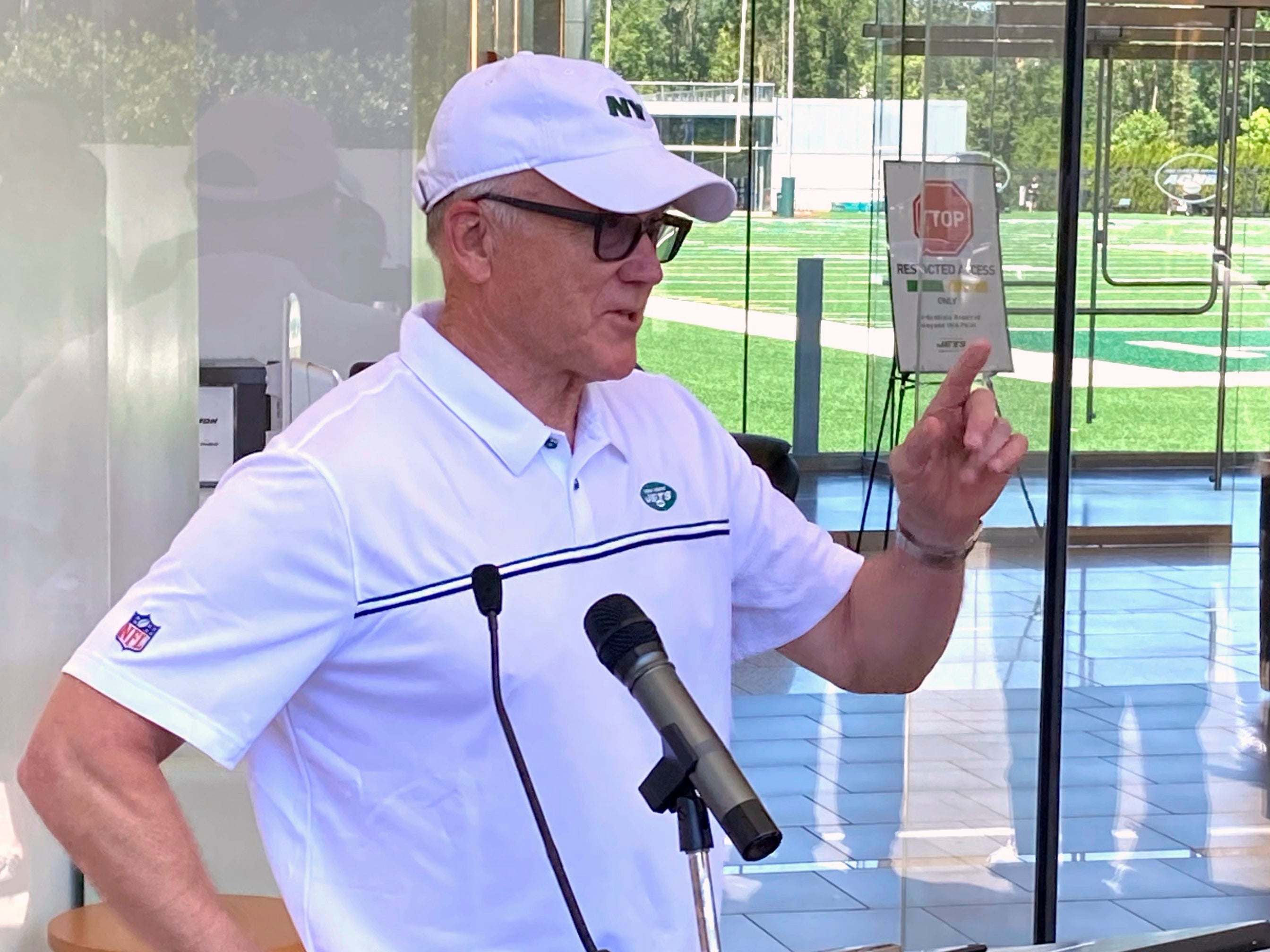 New York Jets owner and chairman Woody Johnson speaks to reporters at the team’s NFL football facility in Florham Park, N.J, Wednesday, June 16, 2021.