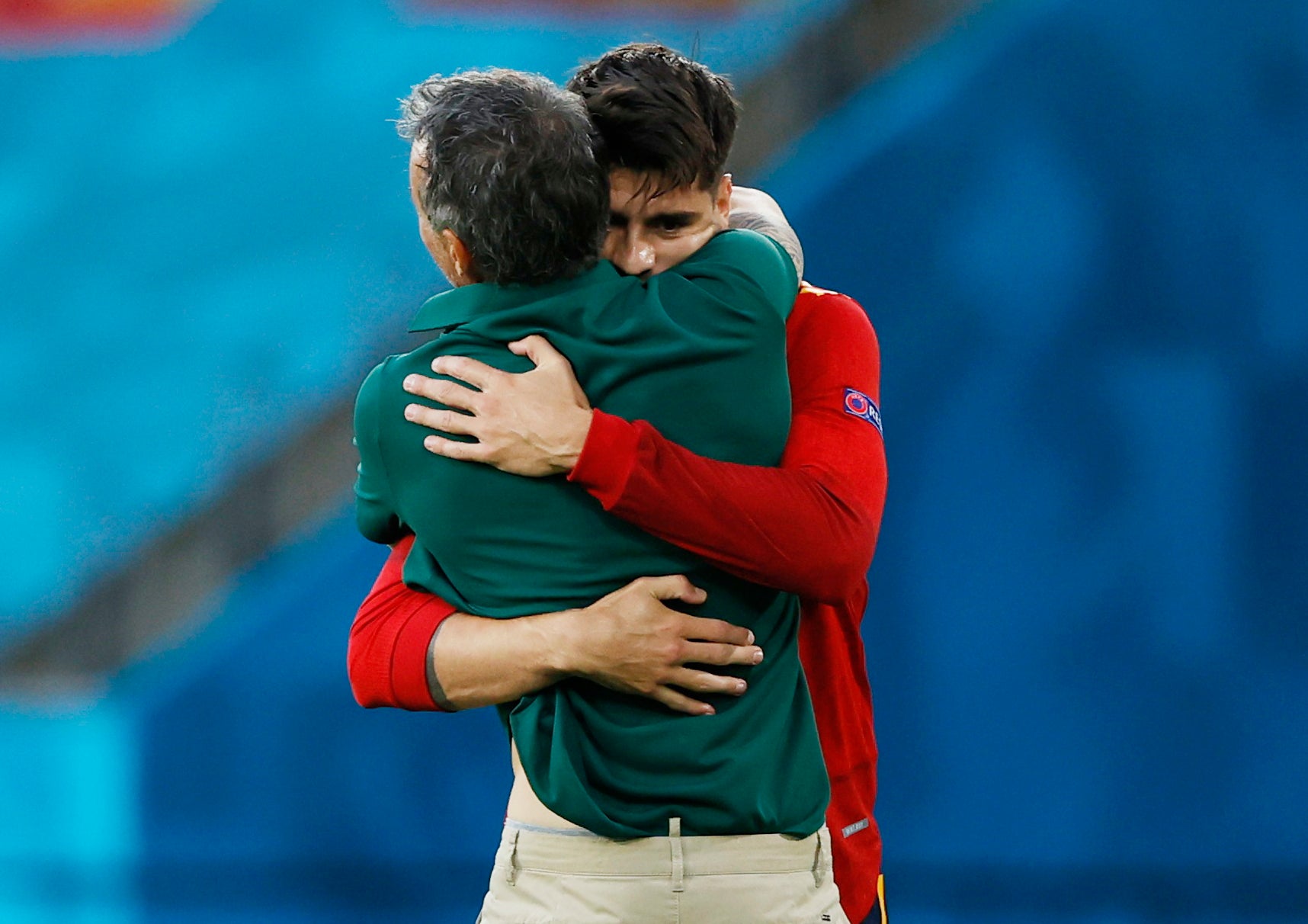 Alvaro Morata hugs manager Luis Enrique after scoring