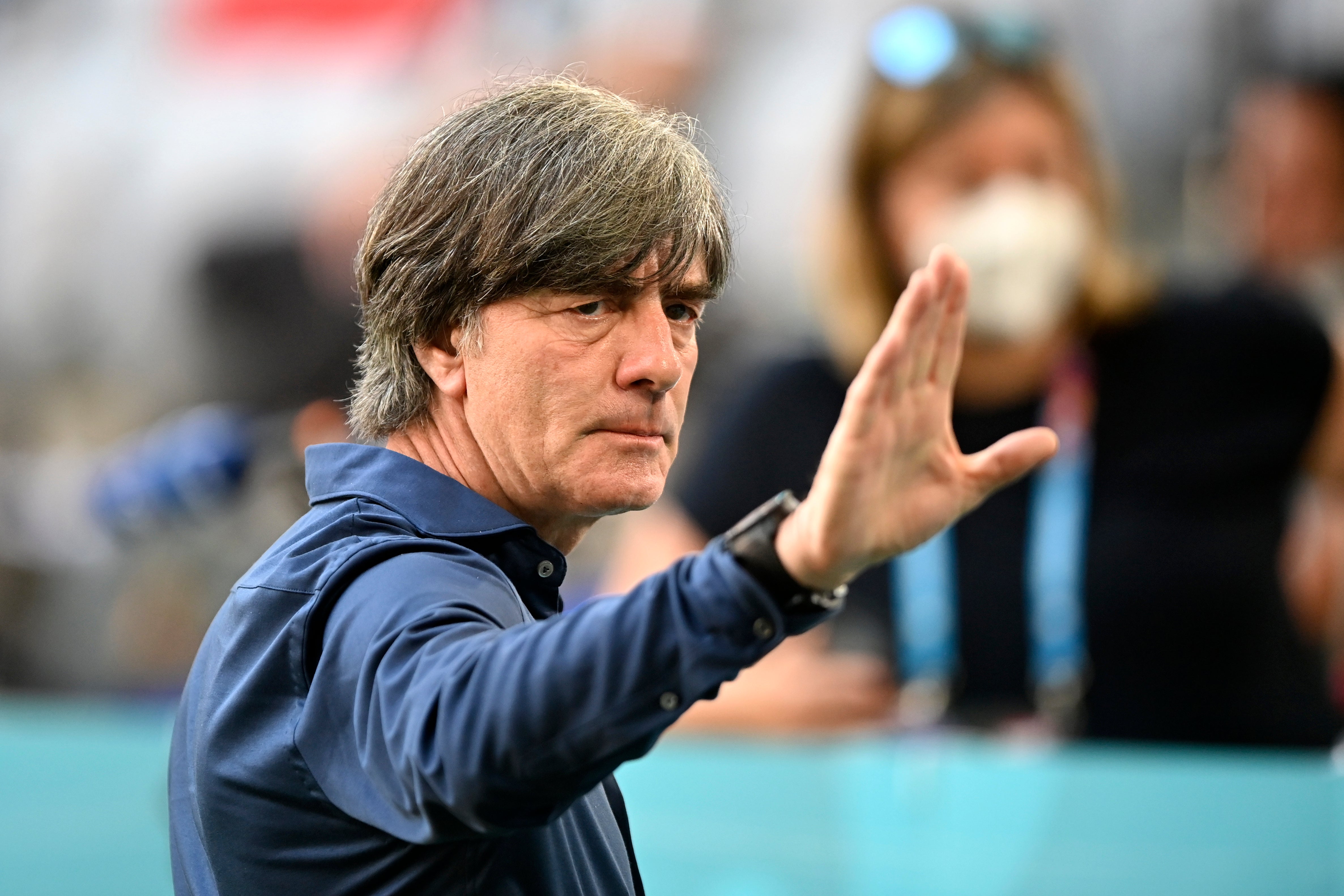 <p>Germany coach Joachim Low gestures towards fans</p>