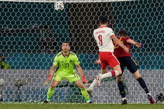 Robert Lewandowski earns Poland point as profligate Spain ...