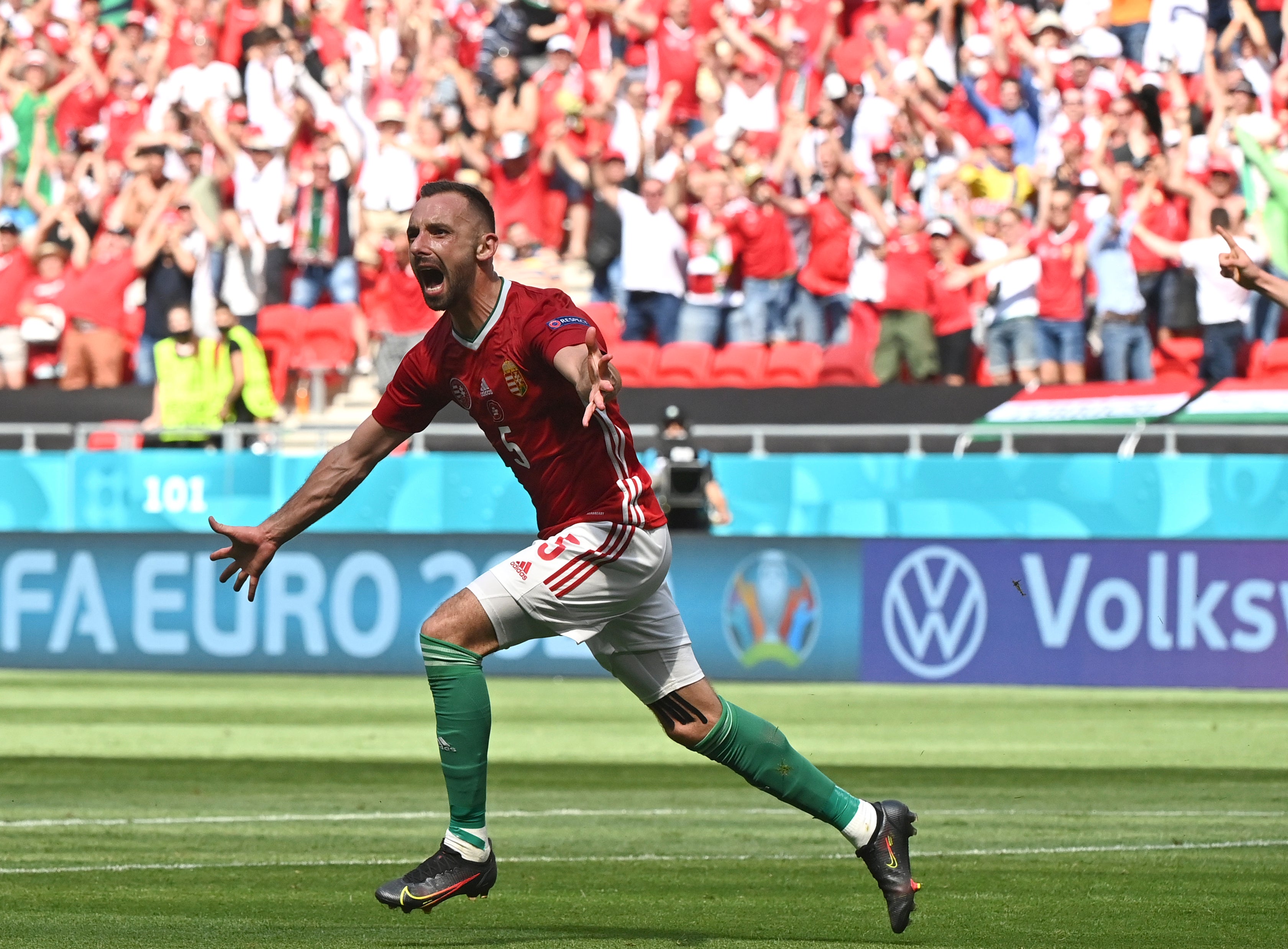 Hungary’s Attila Fiola celebrates scoring the opening goal