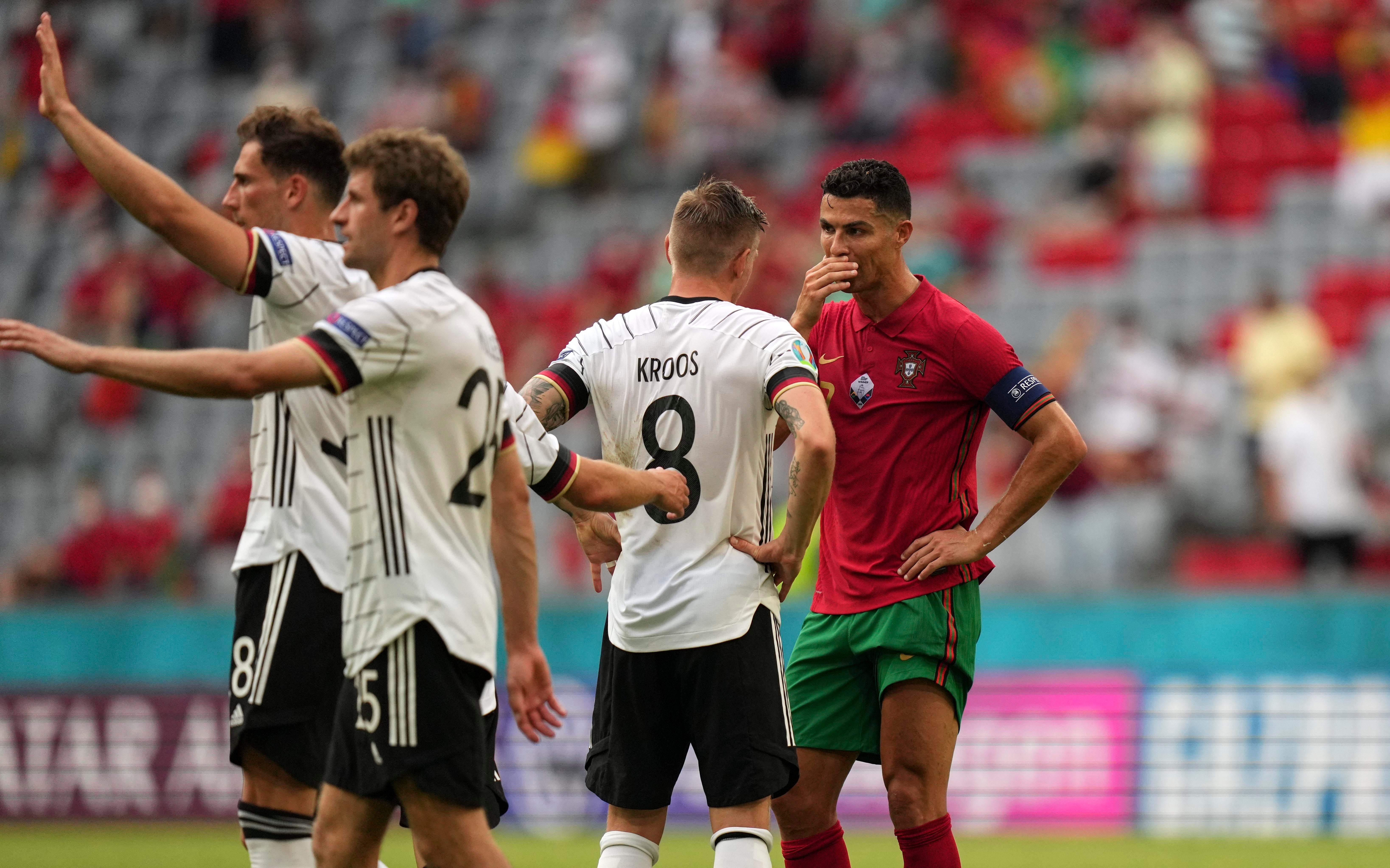 Portugal’s Cristiano Ronaldo (right) talks to Germany’s Toni Kroos after the Euro 2020 match in Munich