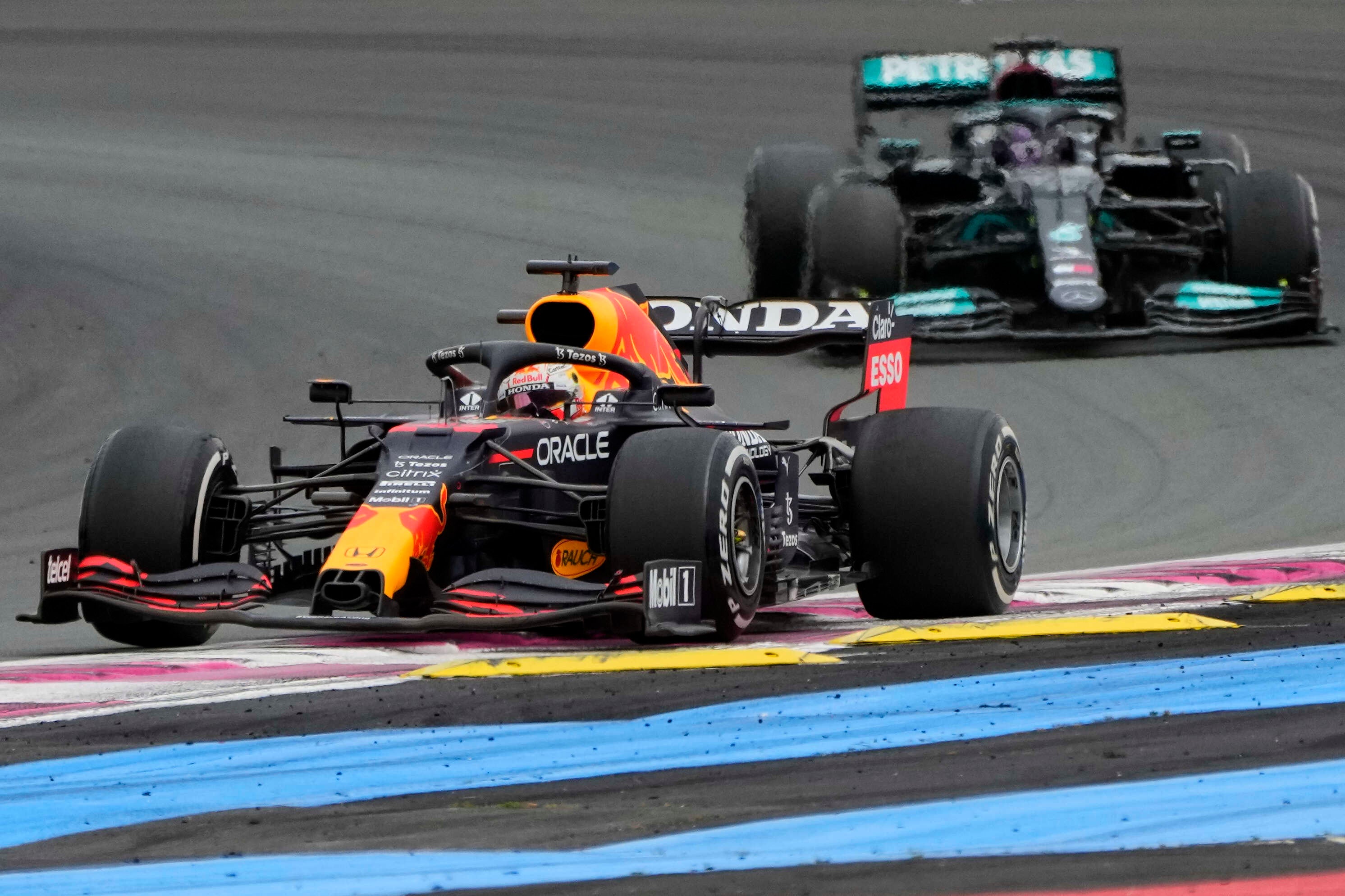 Max Verstappen, left, leads Lewis Hamilton of Britain during the French Grand Prix