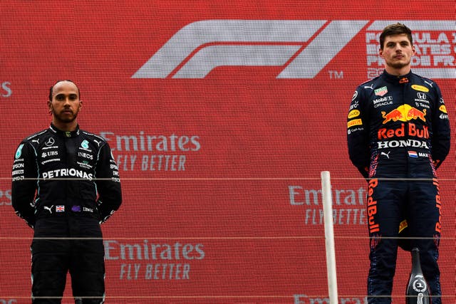 <p>Red Bull driver Max Verstappen, right, and Lewis Hamilton of Mercedes on the podium</p>