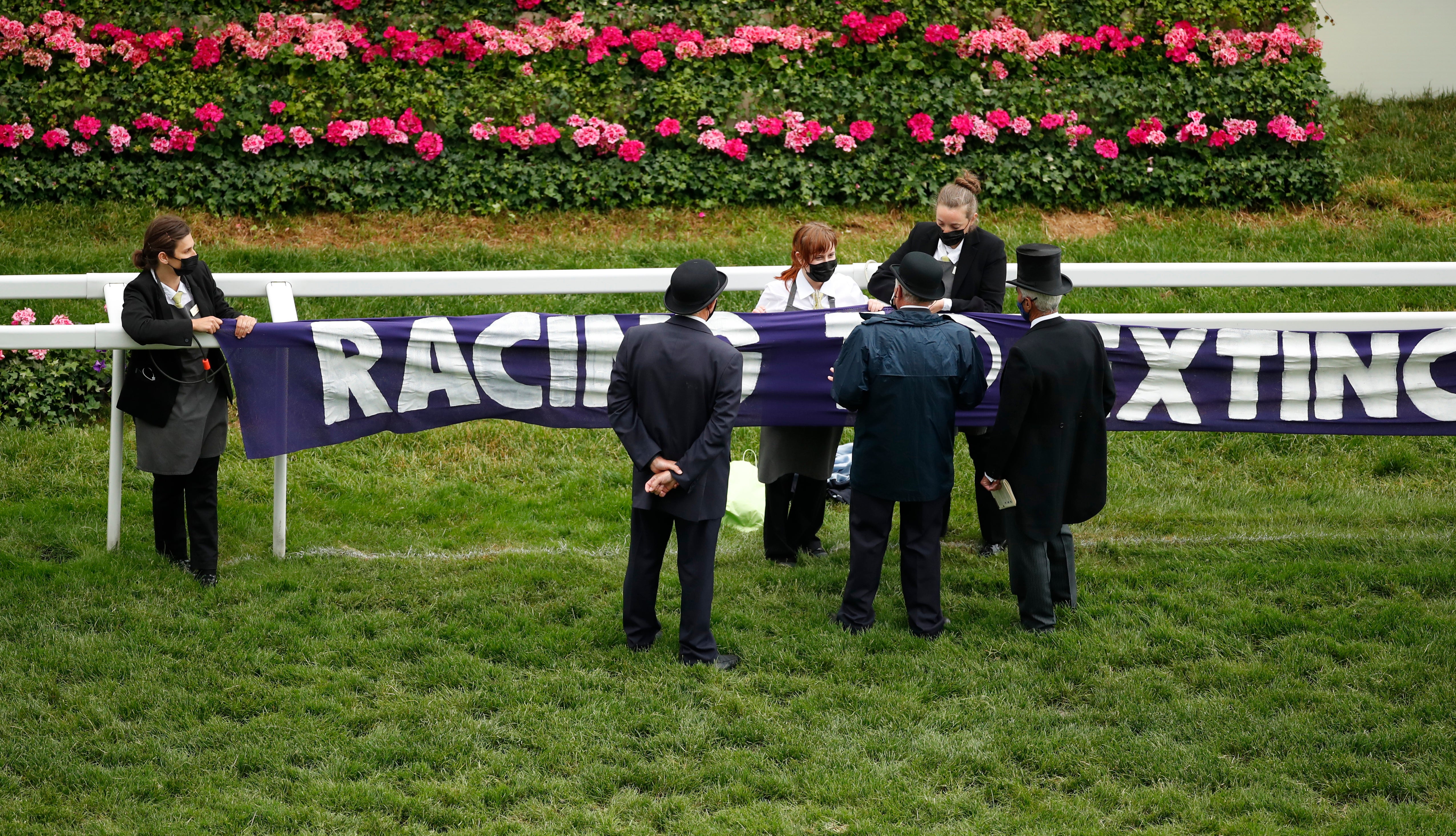 Extinction rebellion protestors at the racecourse during the races