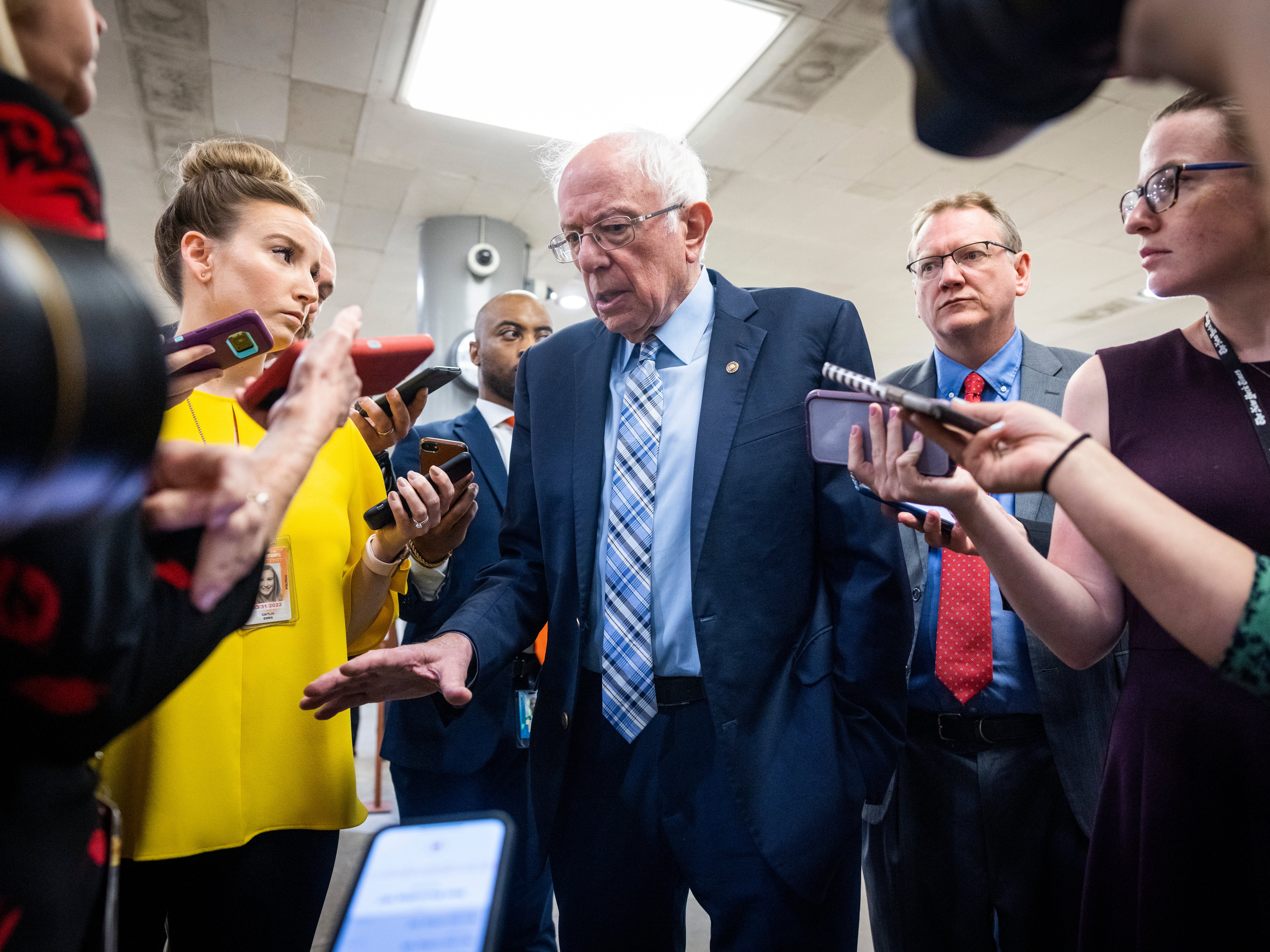 Reporters interview Independent Senator from Vermont Bernie Sanders on his way to the Senate Chamber for a vote in the US Capitol in Washington DC, USA, 16 June 2021.