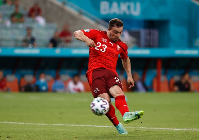 Xherdan Shaqiri scores Switzerland's third goal in their 3-1 win against Turkey