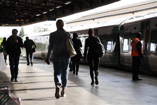 Passengers on a platform at Clapham Junction