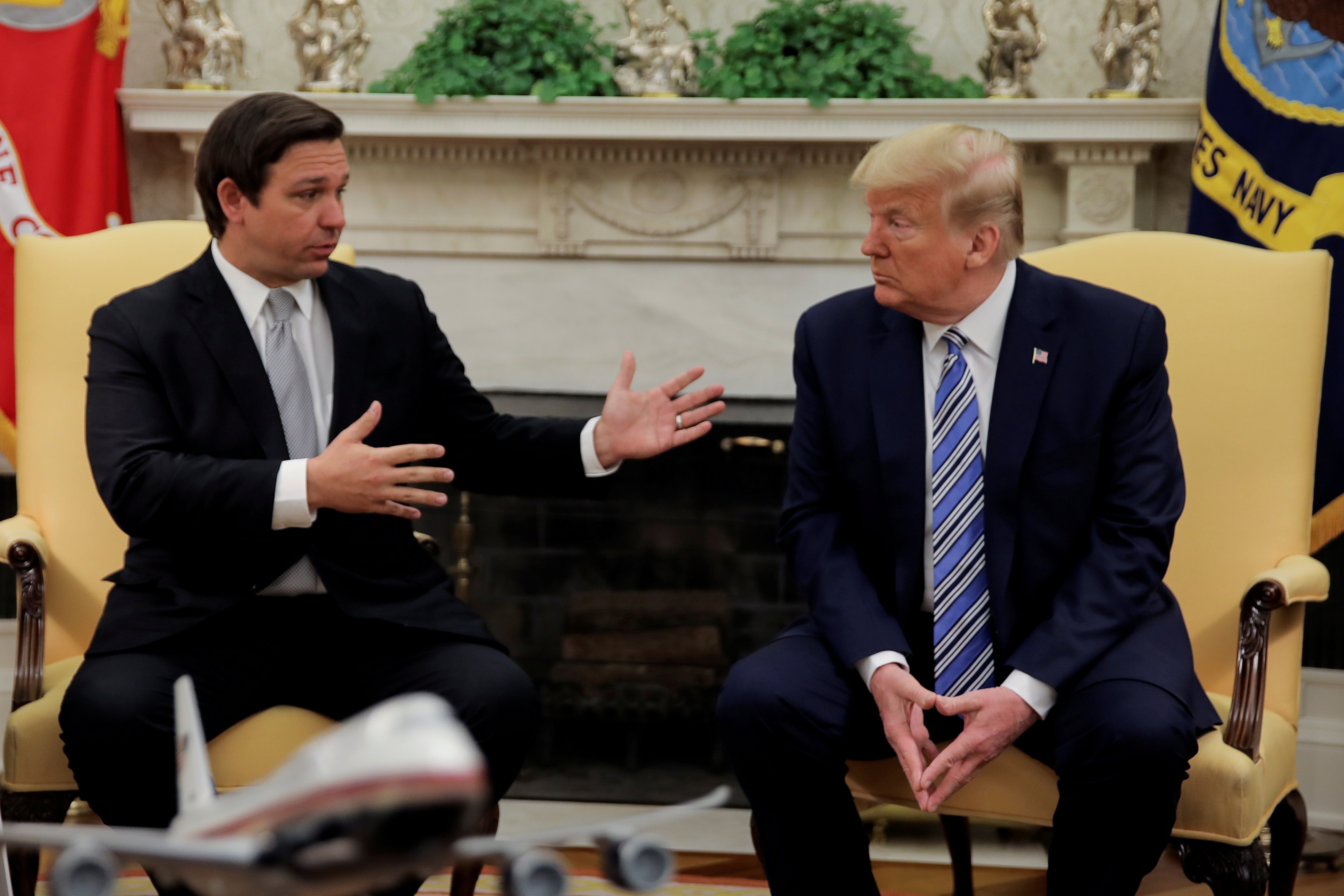 File Former US president Donald Trump meets with Florida Governor DeSantis about coronavirus response at the White House in Washington