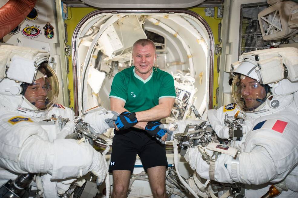 Russian cosmonaut Oleg Novitskiy (middle) poses with Expedition 50 Commander Shane Kimbrough of NASA (left) and Flight Engineer Thomas Pesquet of ESA (European Space Agency) (right) prior to their spacewalk 24 March, 2017