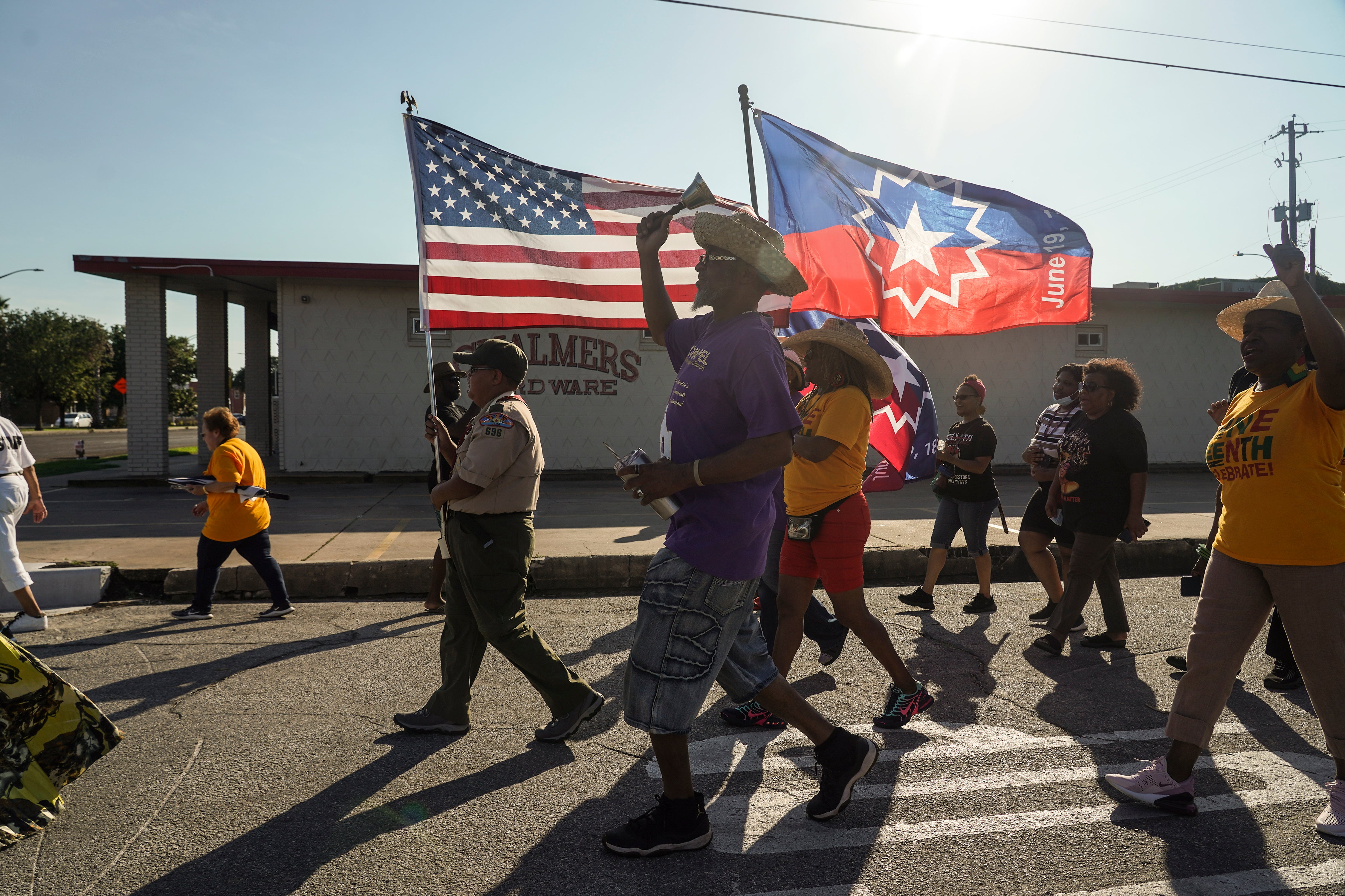 19 June: Members of Reedy Chapel African Methodist Episcopal Church march to celebrate Juneteenth on 19 June 2021 in Galveston, Texas