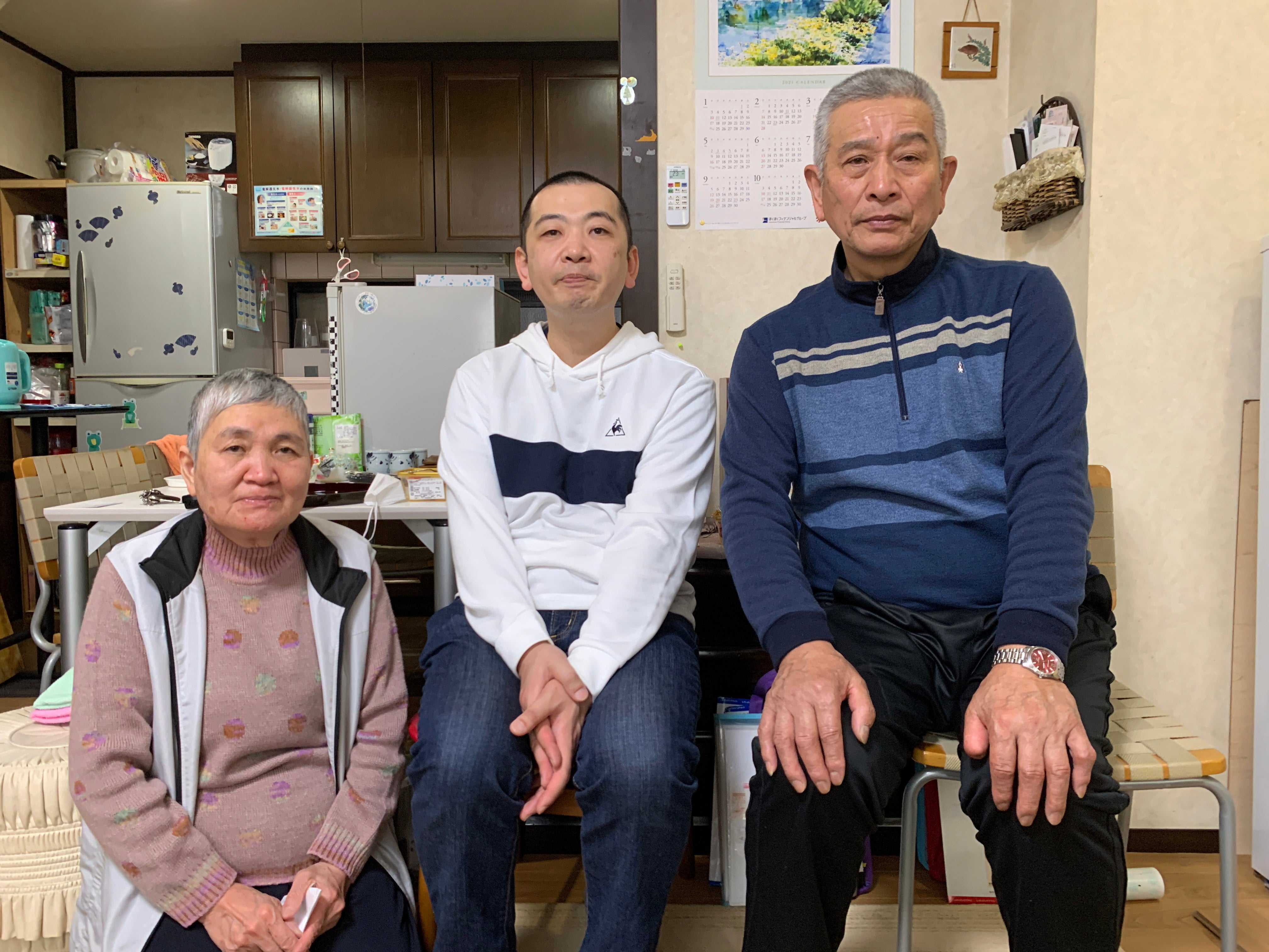 The Ohata family – Sumiko, son Takashi and Masahiro. News of their other son Kazuya’s death came in a phone call