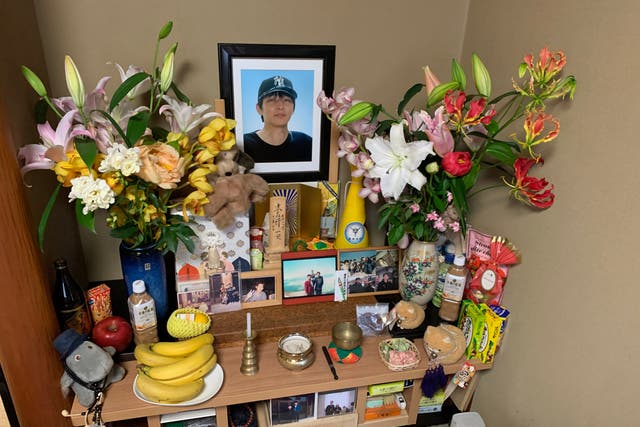 <p>A shrine to Kazuya Ohata at his parents’ home in Kanazawa, Japan. He died at age 40 after being physically restrained in a psychiatric institution </p>