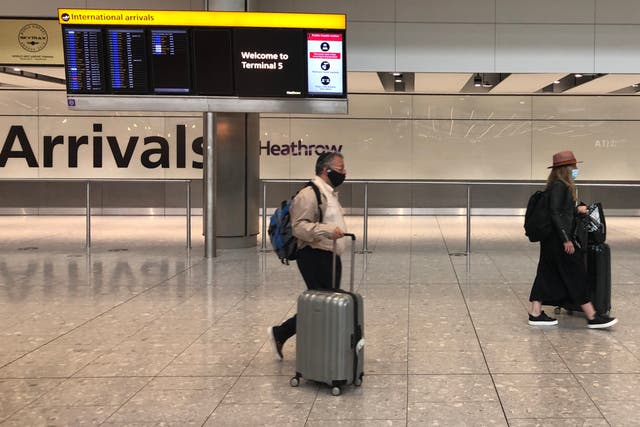 <p>Homeward bound: Arrivals at Heathrow and other airports face a series of tests</p>