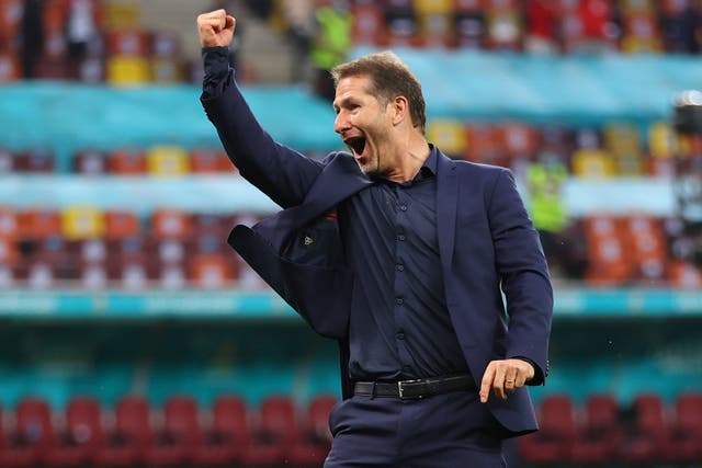 <p>Franco Foda celebrates Austria's win over Ukraine</p>