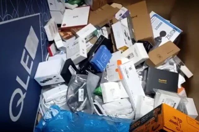 <p>Various technology products they found sorted into boxes marked "destroy" at the Amazon Fulfilment Centre in Dunfermline, Fife</p>