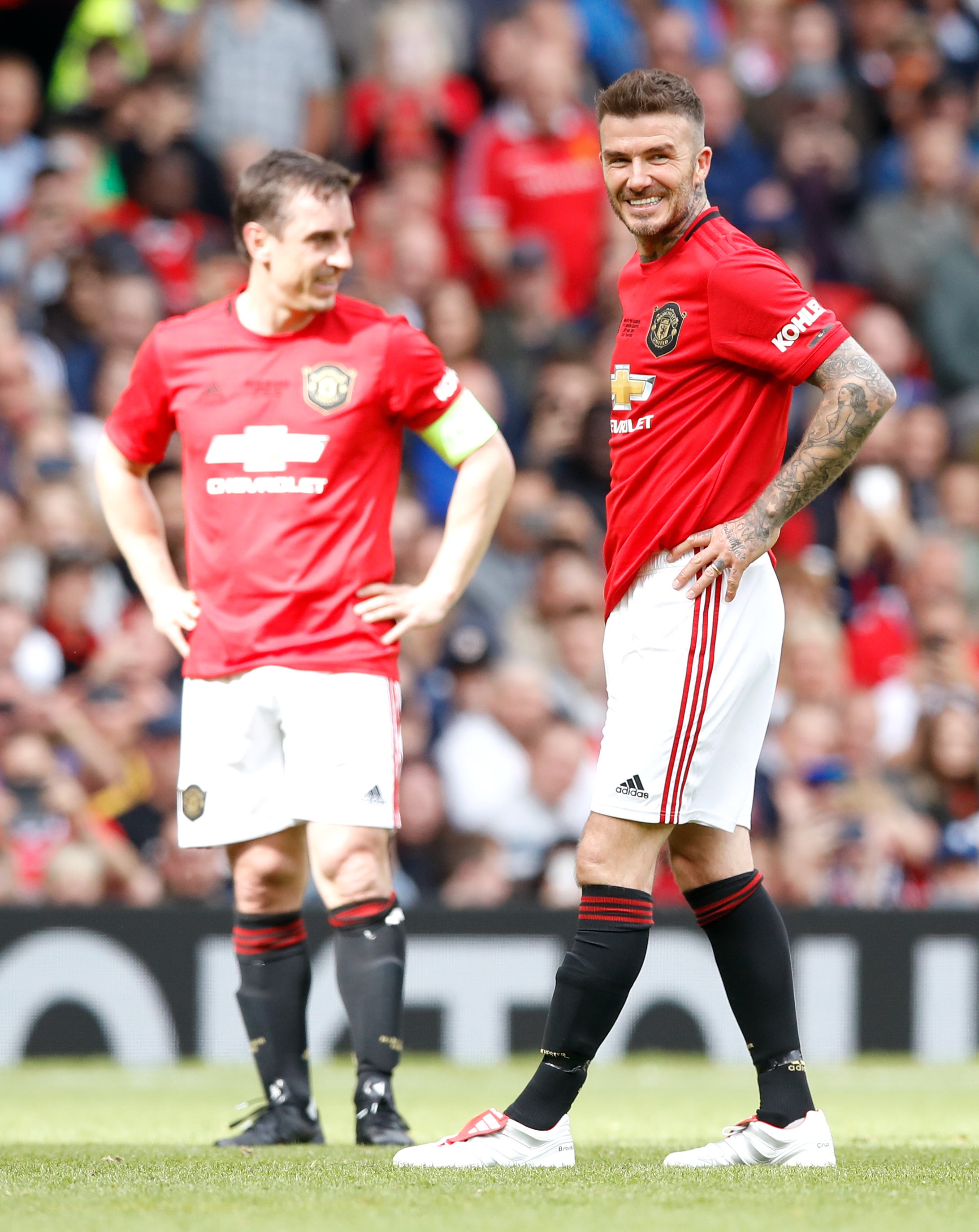 David Beckham, right, and Gary Neville took to social media on Tuesday