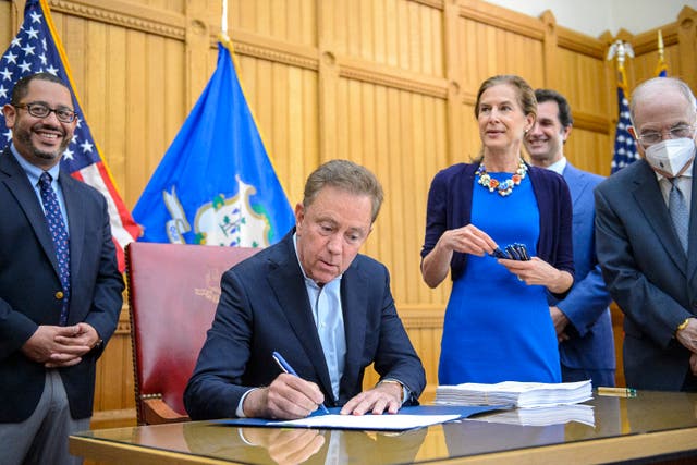 <p>Ned Lamont signs bill allowing 21-year-olds and over to use weed</p>