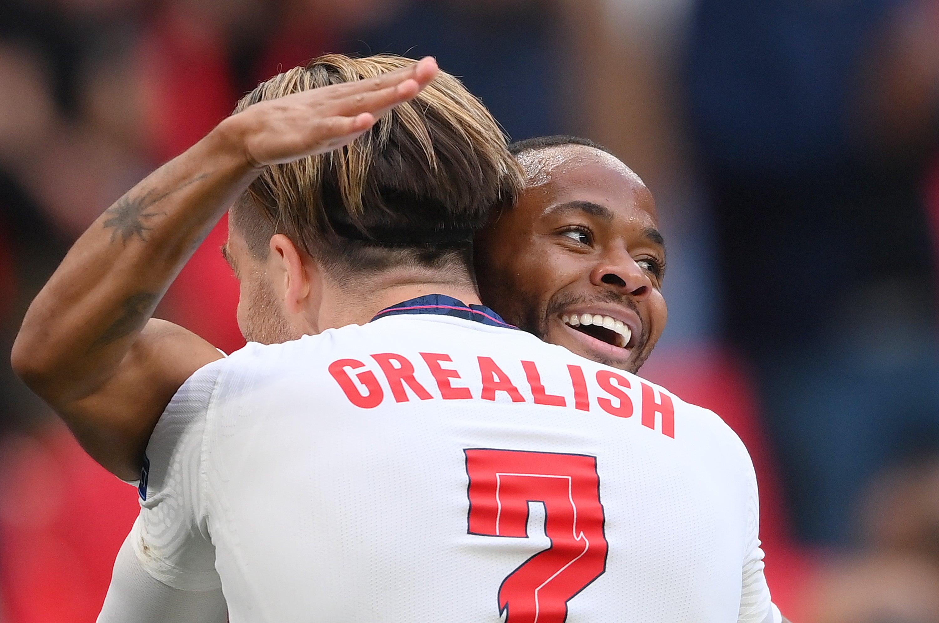 <p>Raheem Sterling of England celebrates with Jack Grealish</p>