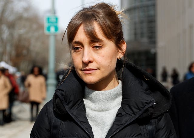 <p>Allison Mack departs United States Federal Court in 2019</p>
