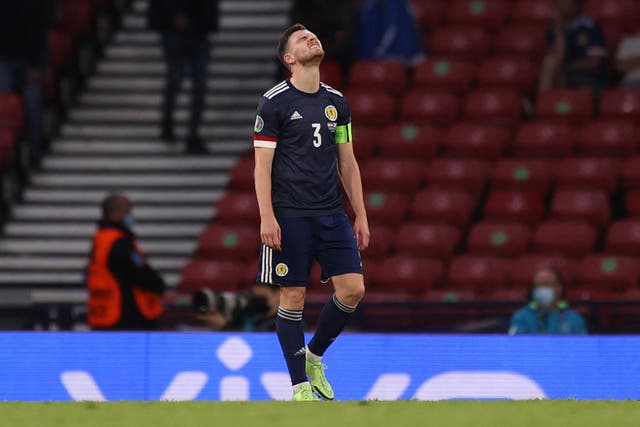 <p>Scotland captain Andy Robertson reacts to his side’s Euro 2020 exit</p>