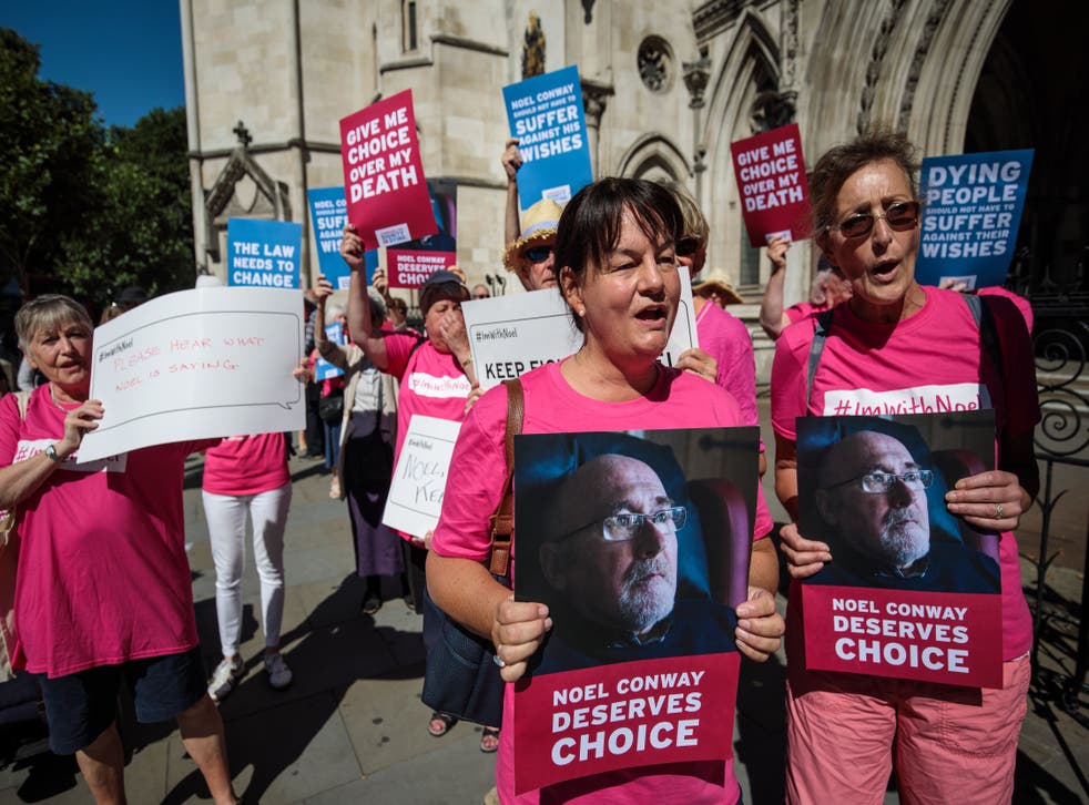 <p>Demonstrators call for a change in the law to support assisted dying outside the Houses of Parliament in central London on October </p>