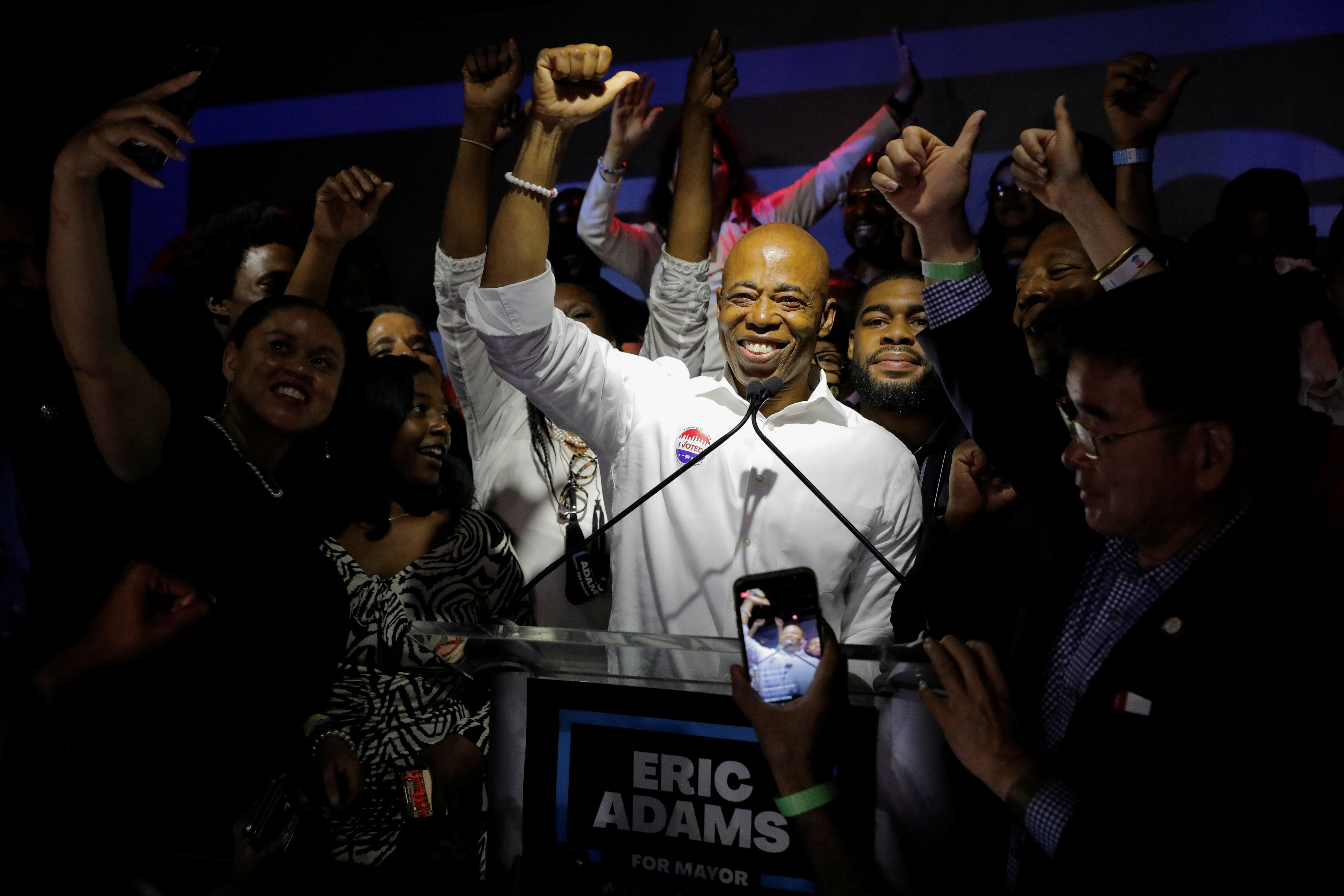 Eric Adams celebrates on primary election night, which saw him in an early lead with roughly 30 per cent of the vote from in-person ballots.