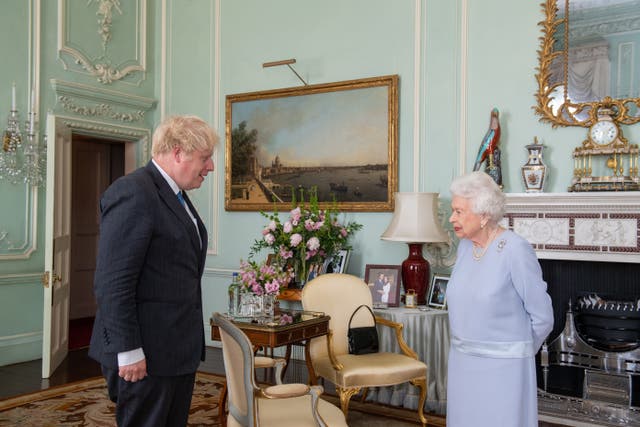 <p>The Queen greets Boris Johnson at Buckingham Palace on Wednesday</p>