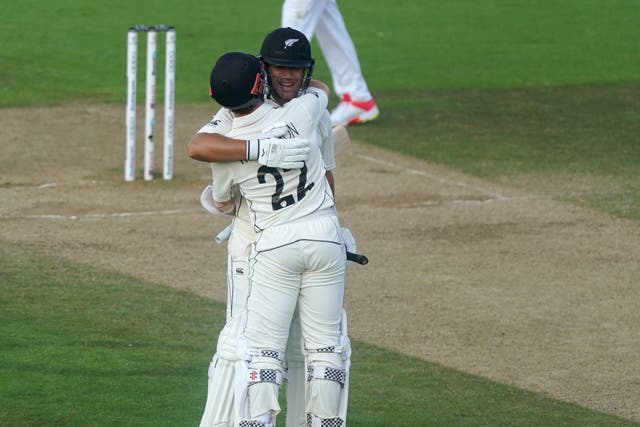 Kane Williamson (right) and Ross Taylor celebrate winning the match