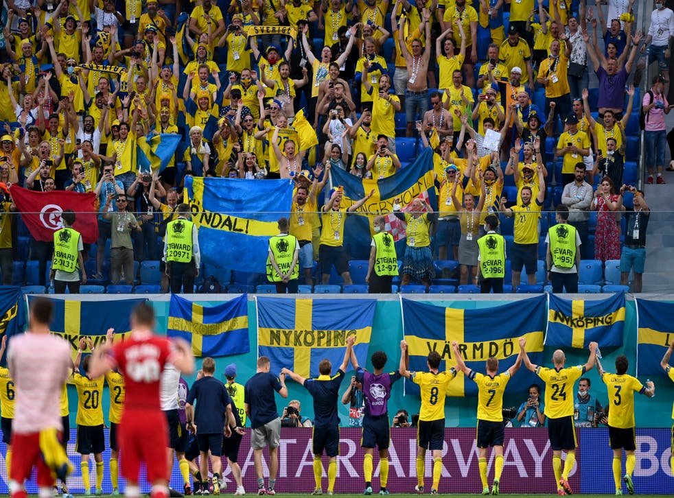 <p>Sweden celebrate with their fans in St Petersburg after winning their final group match against Poland</p>