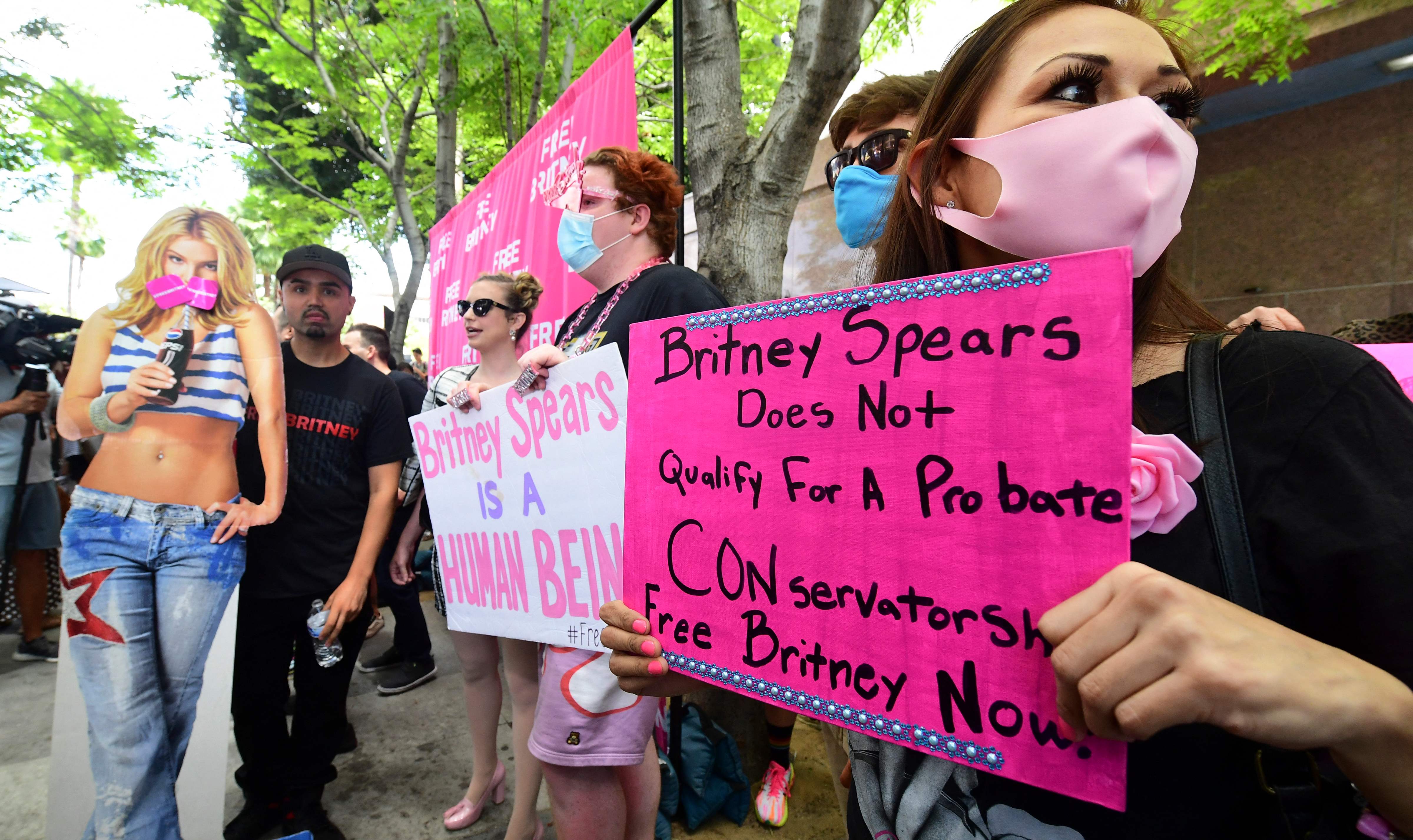 Fans and supporters of Britney Spears gather outside the County Courthouse in Los Angeles, Calfornia on June 23, 2021, during a scheduled hearing in Spears' conservatorship case