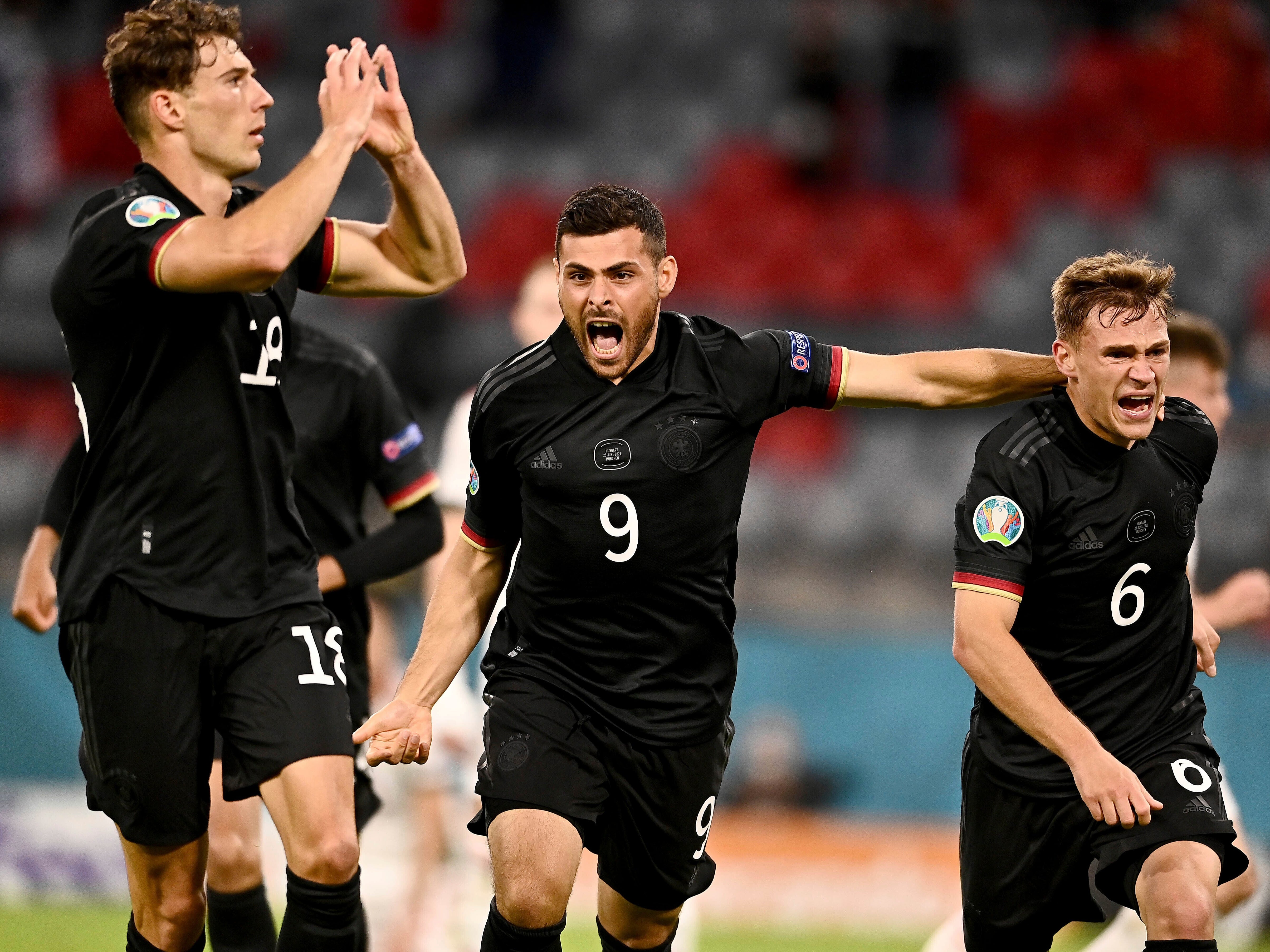 Germany's Mats Hummels, centre, heads on goal during the Euro 2020