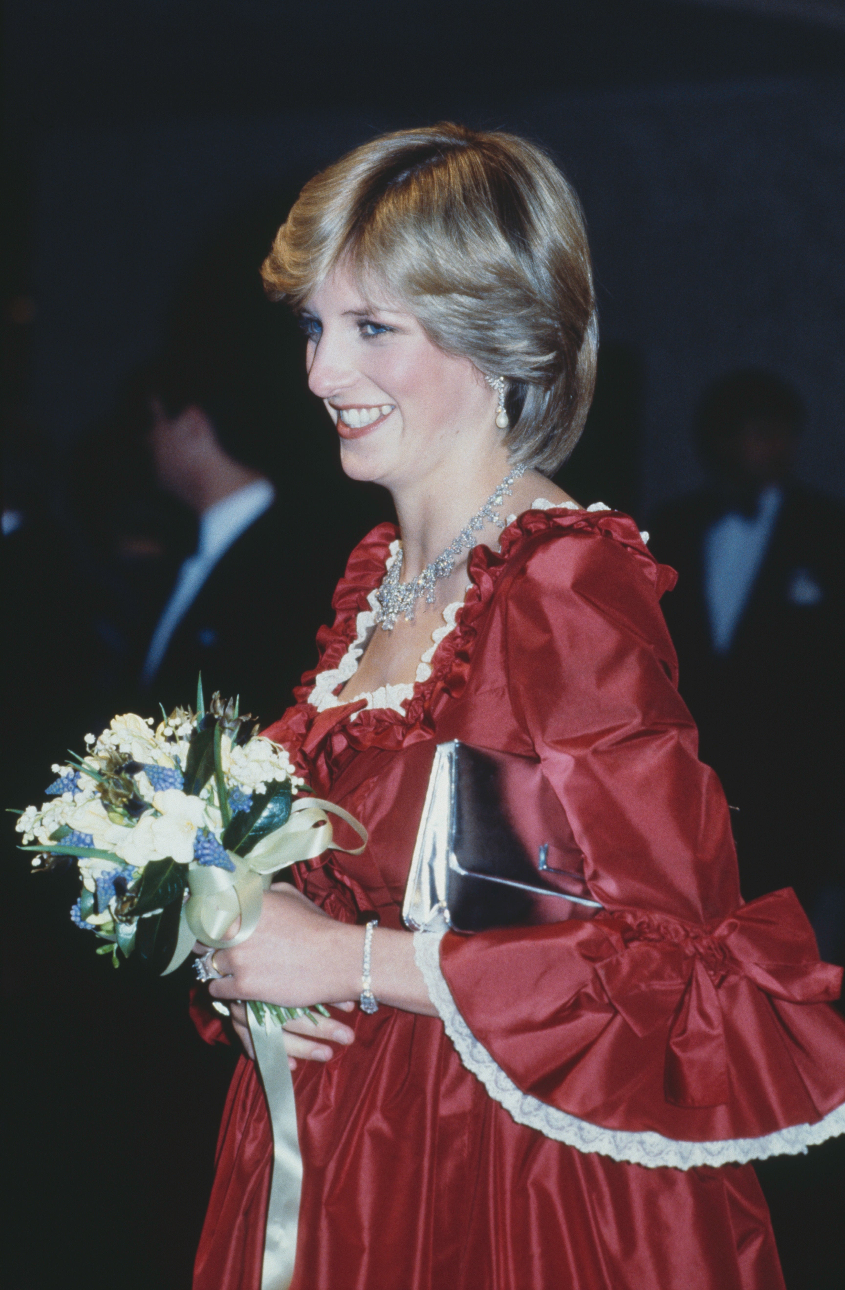 This unforgettable dress was worn by Diana in 1982 to an event at the Barbican Arts Centre. The crimson and white taffeta number featured a fitted bodice and a wide skirt. Memorable in more ways than one, this dress was actually a maternity ensemble, designed by David Sassoon .