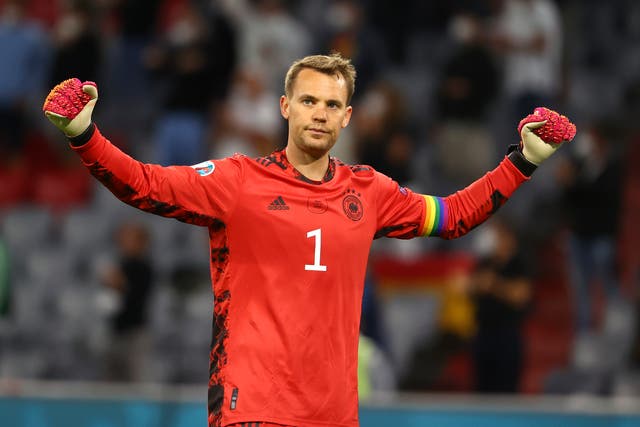 <p>Manuel Neuer wearing a rainbow armband during Germany's 2-2 draw with Hungary on Wednesday (Kai Pfaffenbach/AP).</p>