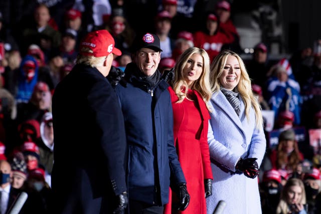 <p>Jared Kushner, Ivanka Trump, and daughter Tiffany Trump listen to US President Donald Trump during a Make America Great Again rally on 2 November 2020</p>
