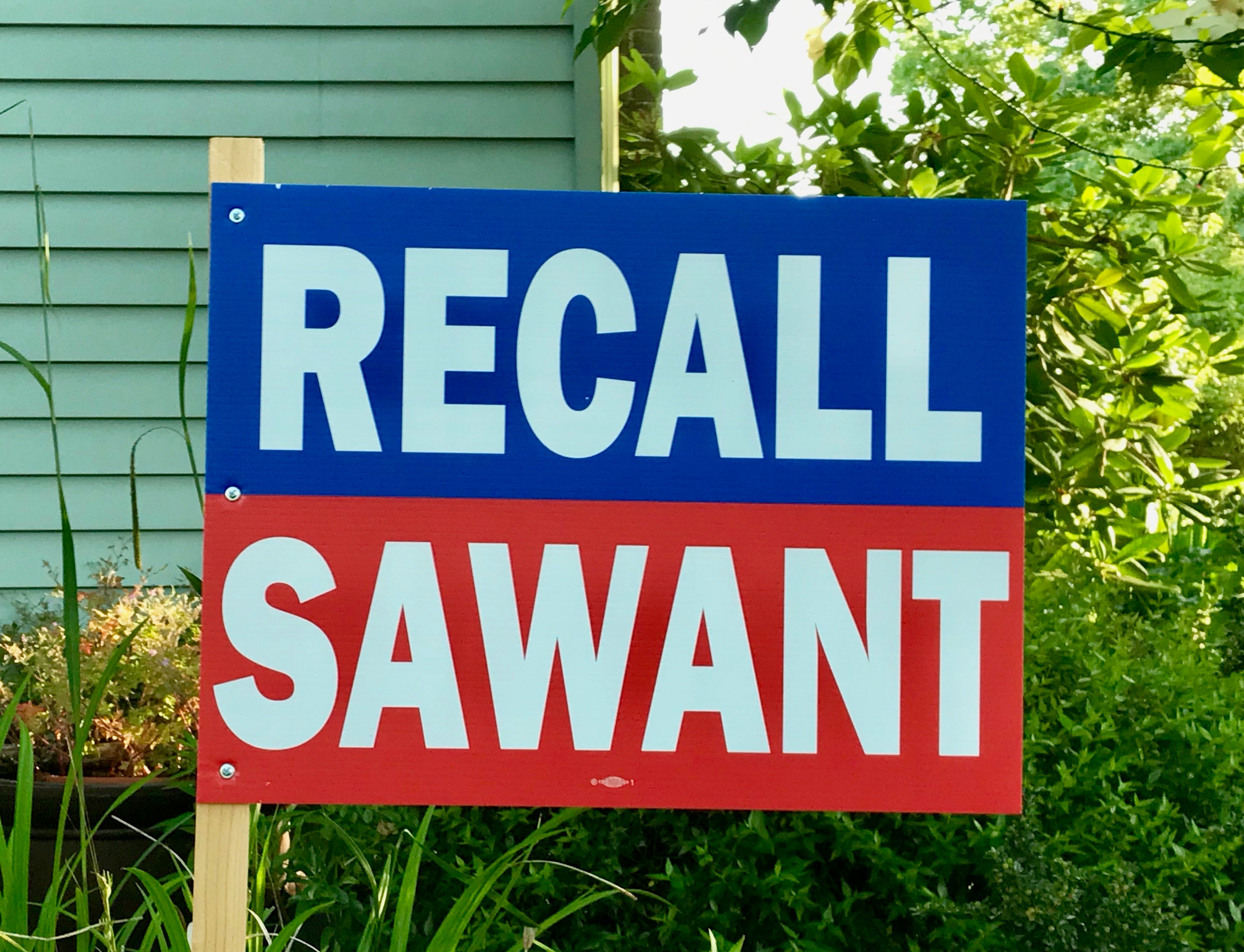 Signs for and against the recall are popping up in Seattle’s ward three