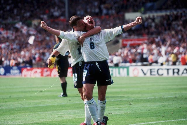 <p>Paul Gascoigne and Teddy Sheringham celebrate during Euro ’96 – the last time football truly came home</p>