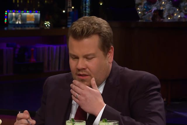 <p>James Corden participating in a ‘Spill Your Guts or Fill Your Guts’ segment</p>