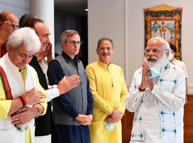 <p>The photograph provided by the Prime Minister’s Office shows Indian PM Narendra Modi greeting members of various political parties before their meeting in New Delhi on 24 June, 2021</p>