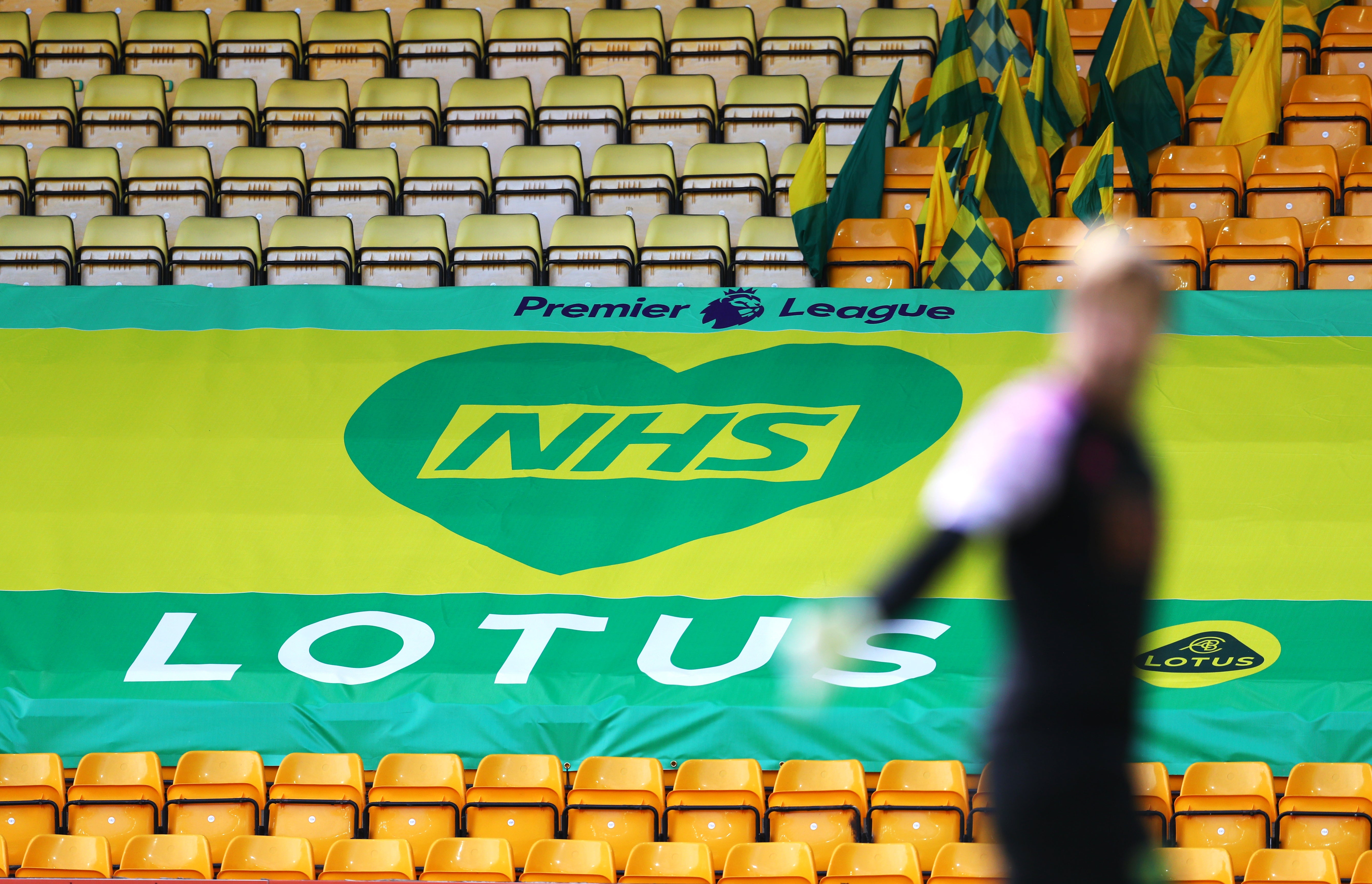 A general view of a NHS Lotus Premier League banner in the stands at Carrow Road