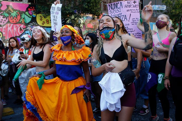 <p>Women take part in a rally in support of legal abortion on International Women's Day in Santiago, Chile, on 8 March</p>
