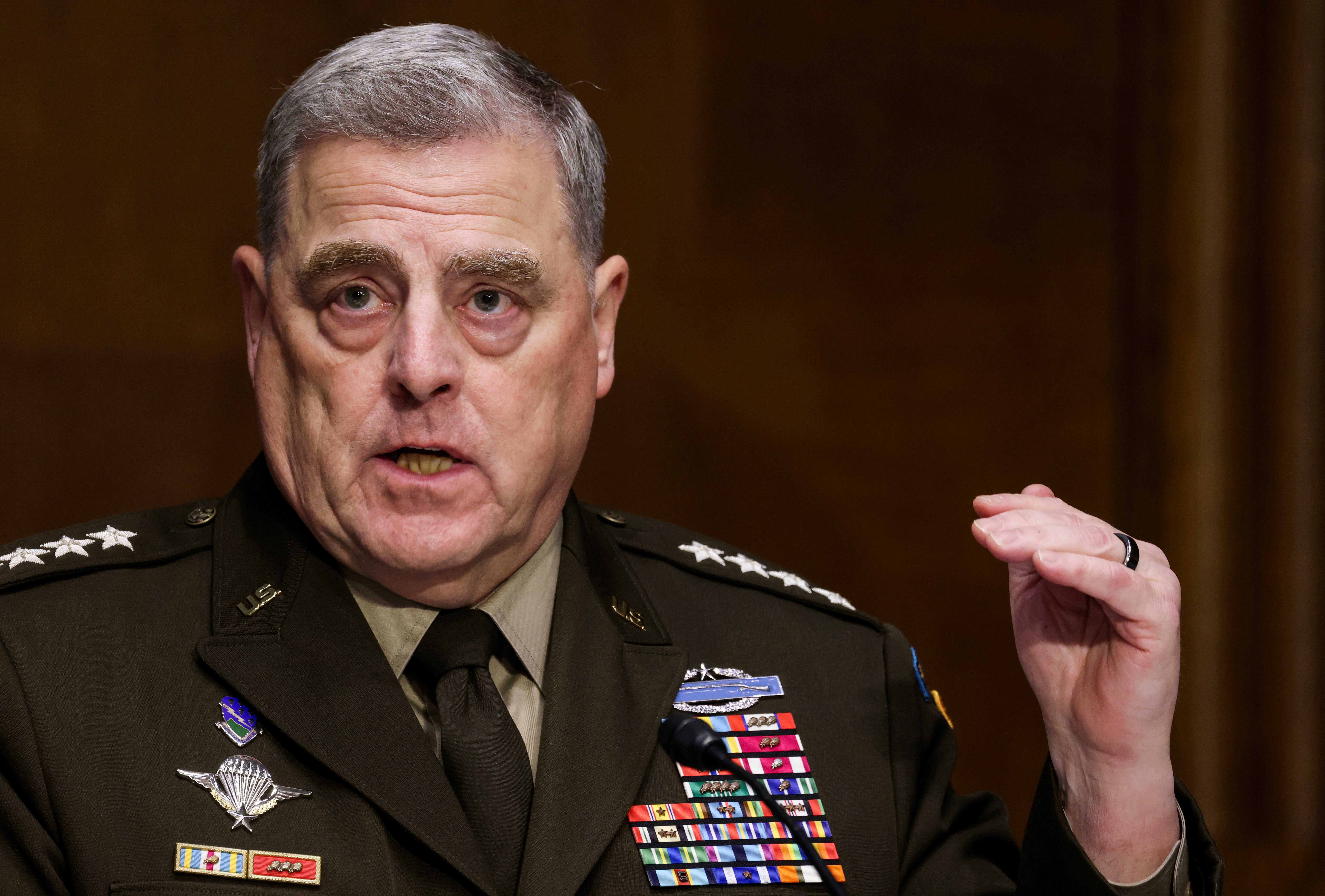 Joint Chiefs of Staff Chair Gen Mark Milley testifies on the Defense Department’s budget request during a Senate Appropriations Committee hearing on Capitol Hill on 17 June, 2021 in Washington, DC. Mr Milley repeatedly rebuffed calls from former President Donald Trump and associates for violent military intervention in protests last year, a new book claims.