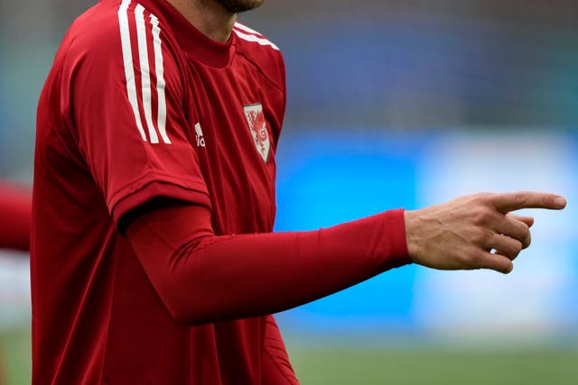 Wales forward Gareth Bale laughs during training