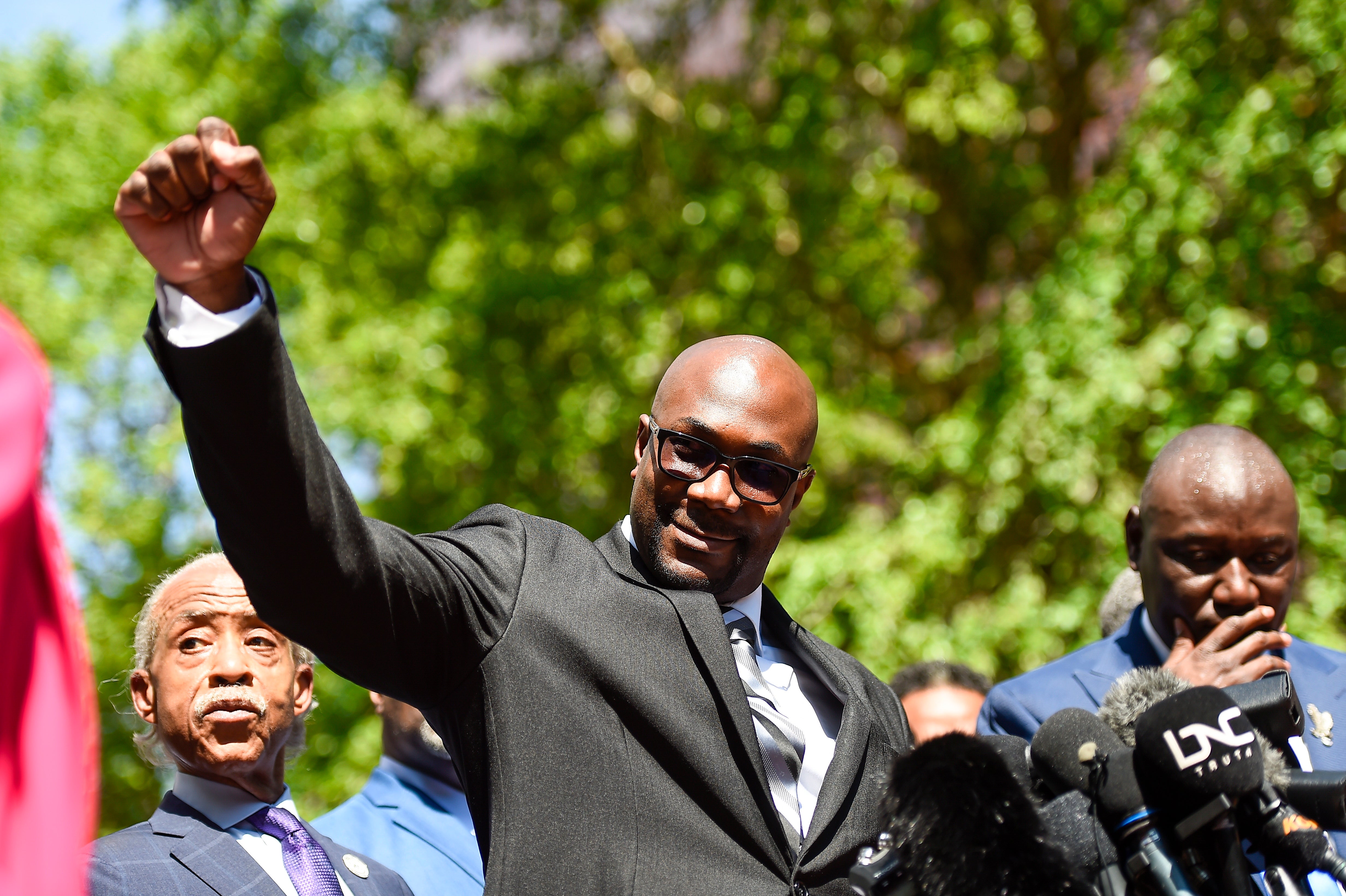 Philonise Floyd reacts to supporters after the sentencing