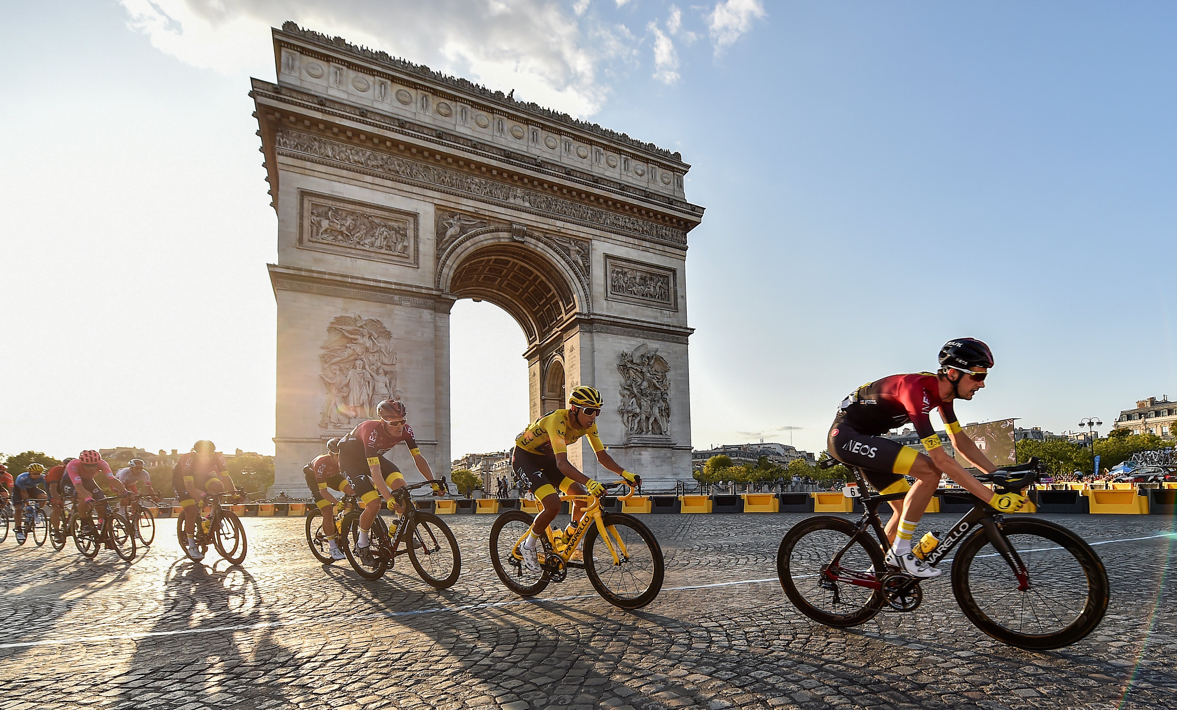 Team Ineos Egan Bernal cycles past the Arc De Triomphe during stage 21 of the Tour de France in 2019