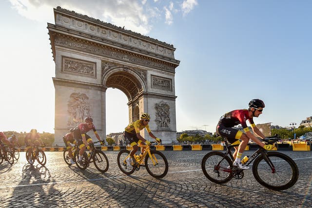Team Ineos Egan Bernal cycles past the Arc De Triomphe during stage 21 of the Tour de France in 2019