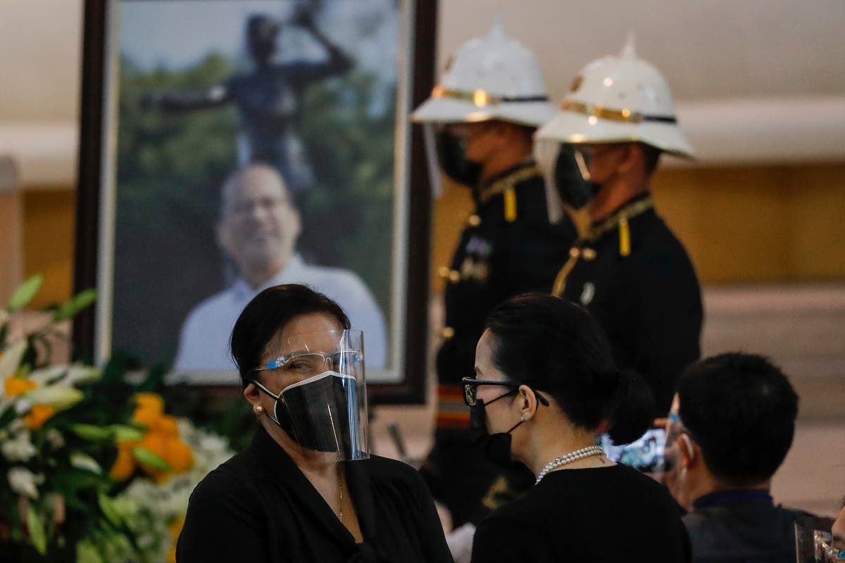 Aquino, Philippine ex-leader who challenged China, is buried