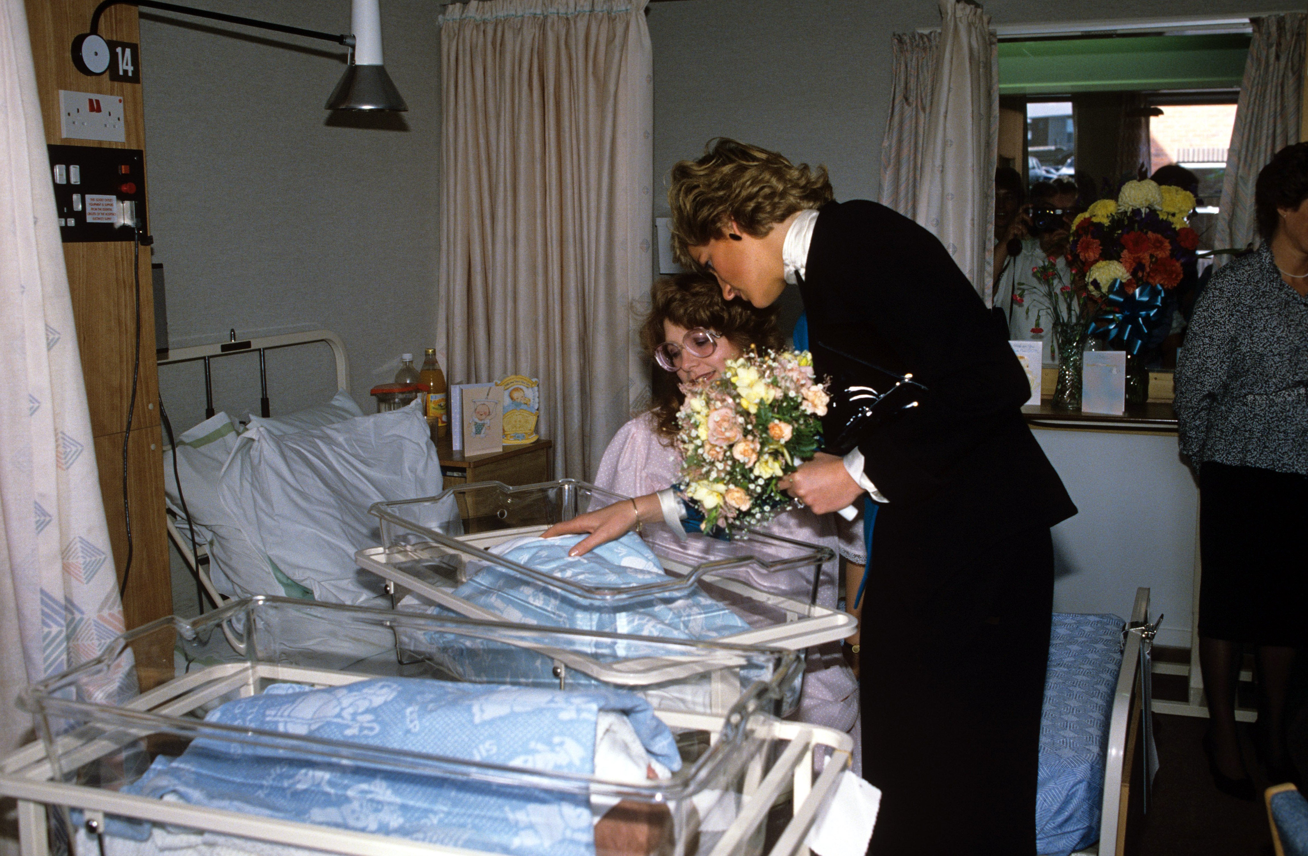 Princess Diana visiting a mother and baby at the Teeside Hospice Care Foundation in Middlesborough, 1988.