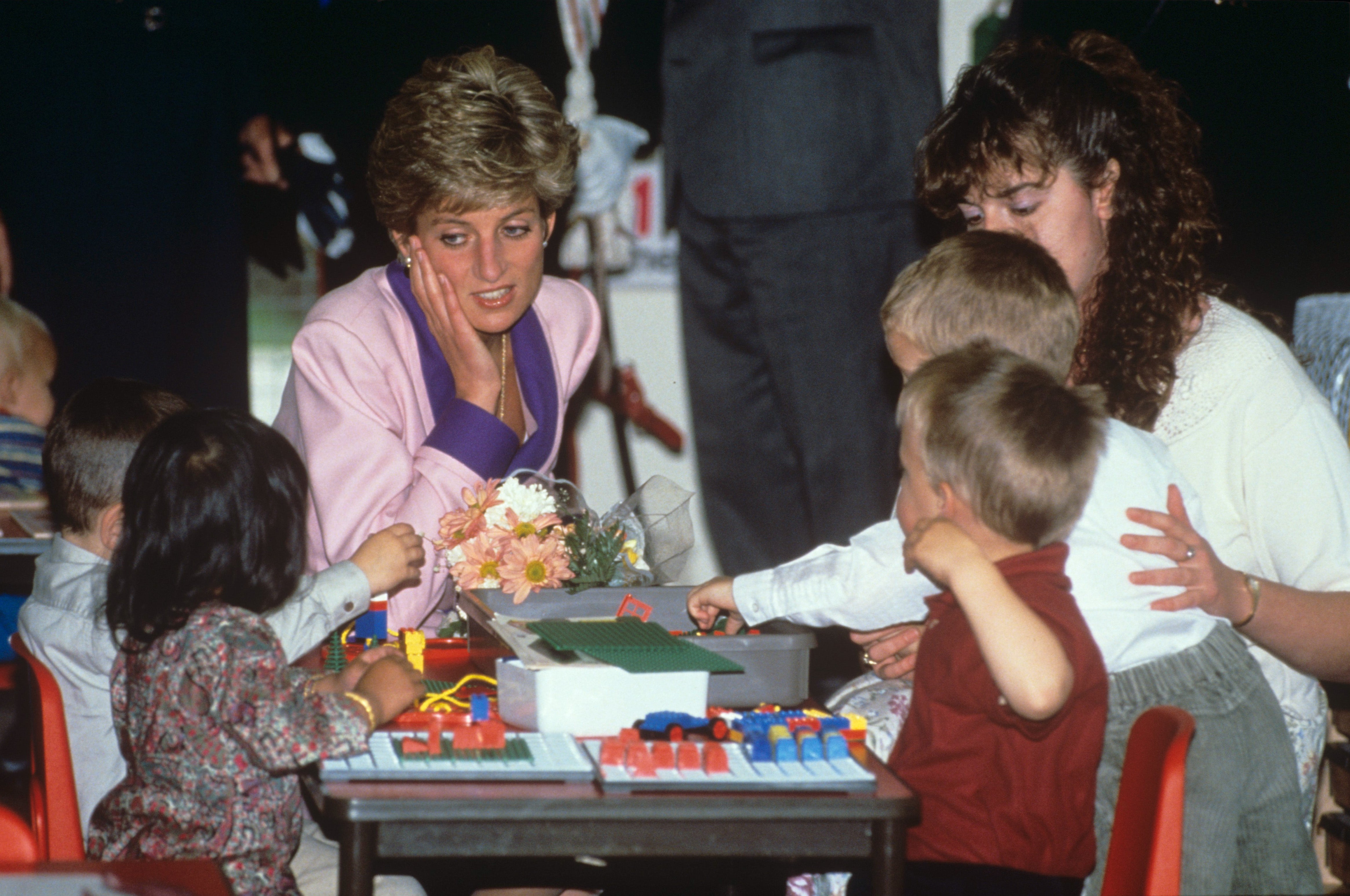 Princess Diana with children at the Glamorgan Mission in for the Deaf in Wales in 1991.